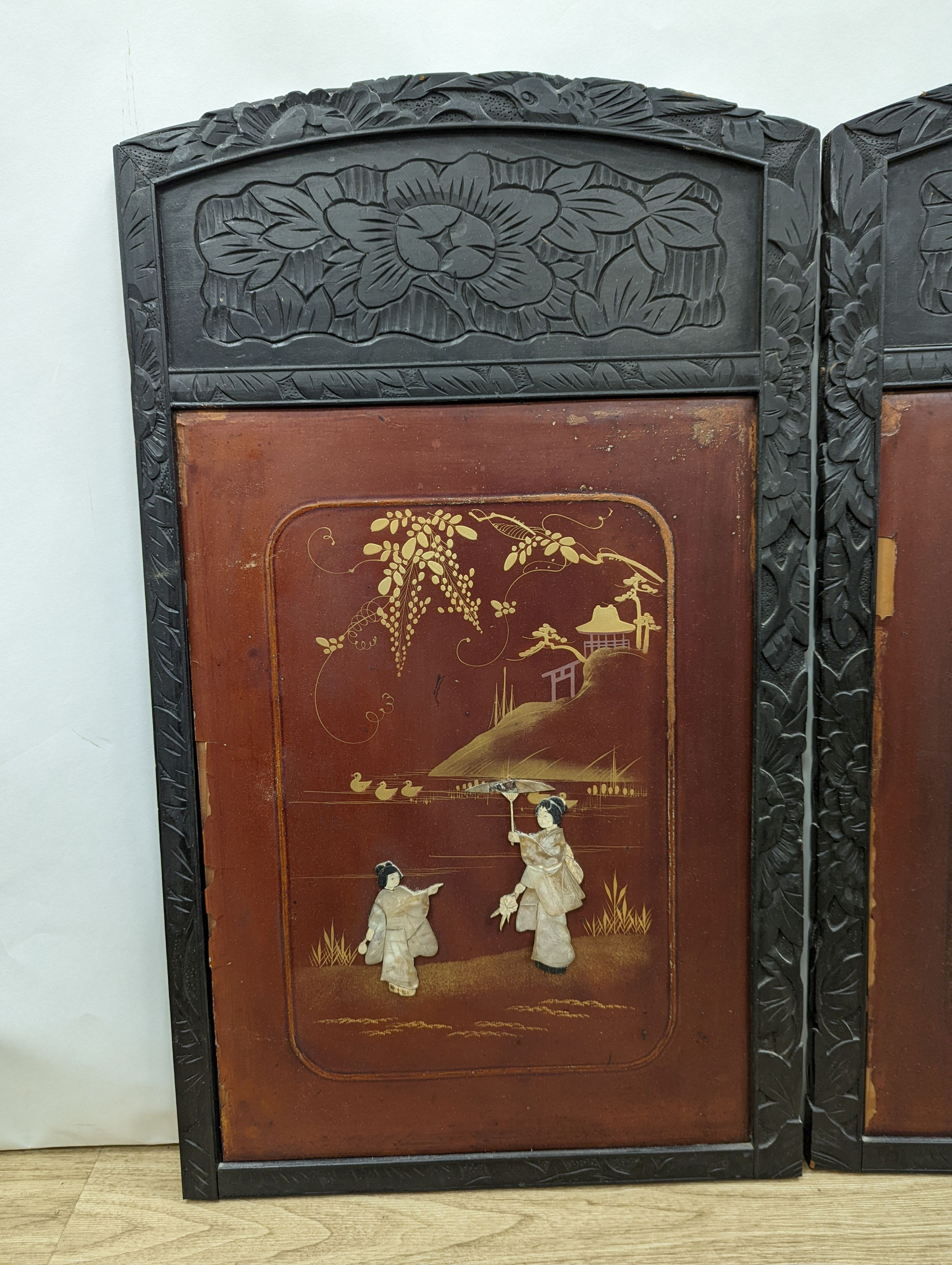 A pair Japanese bone and mother of pearl overlaid red lacquer panels, each 72 x 42.5 cm